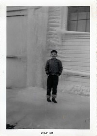 Bruce in front of frozen wall - 1957