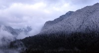 Carbon River hills snowy dusk