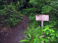 Oil City trail milage sign