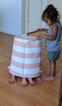 Olive examining Zoeys new hat