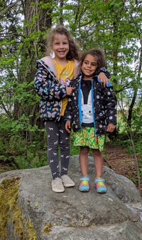 Zoey and Olive on a rock
