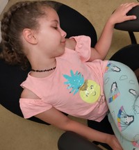 Zoey in computer room chair