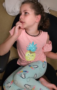 Zoey in computer room chair