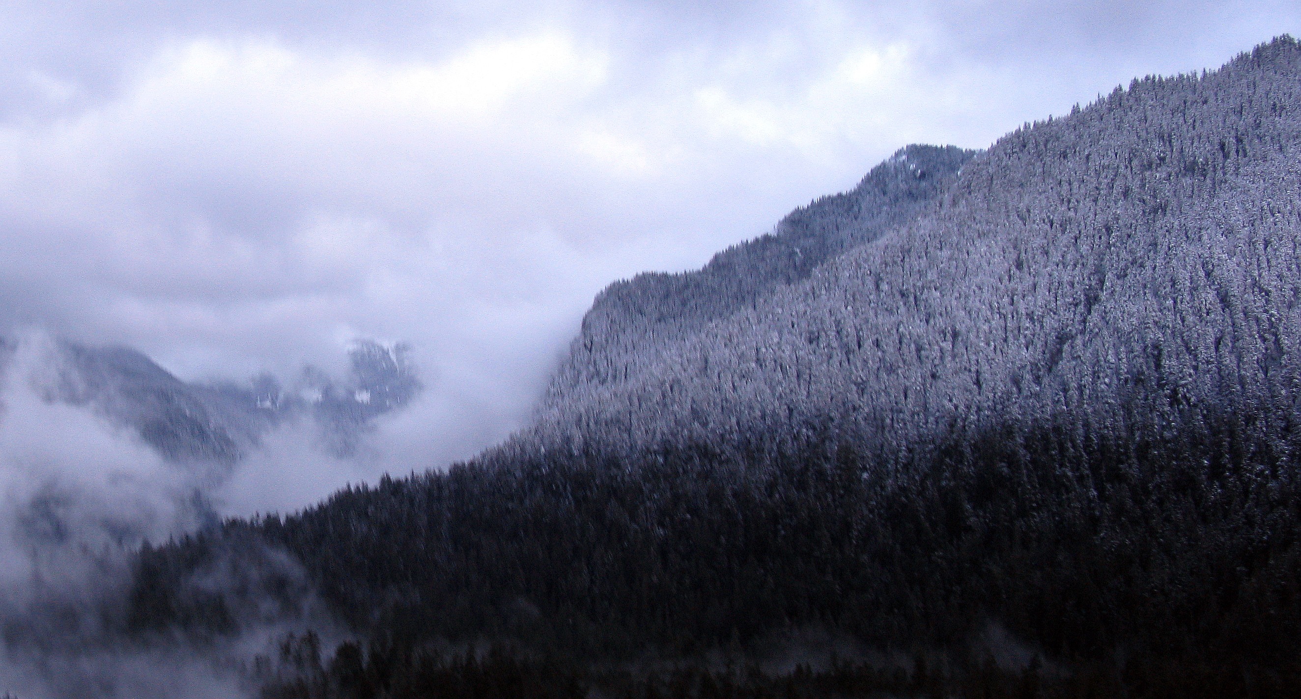 Carbon River hills snowy dusk