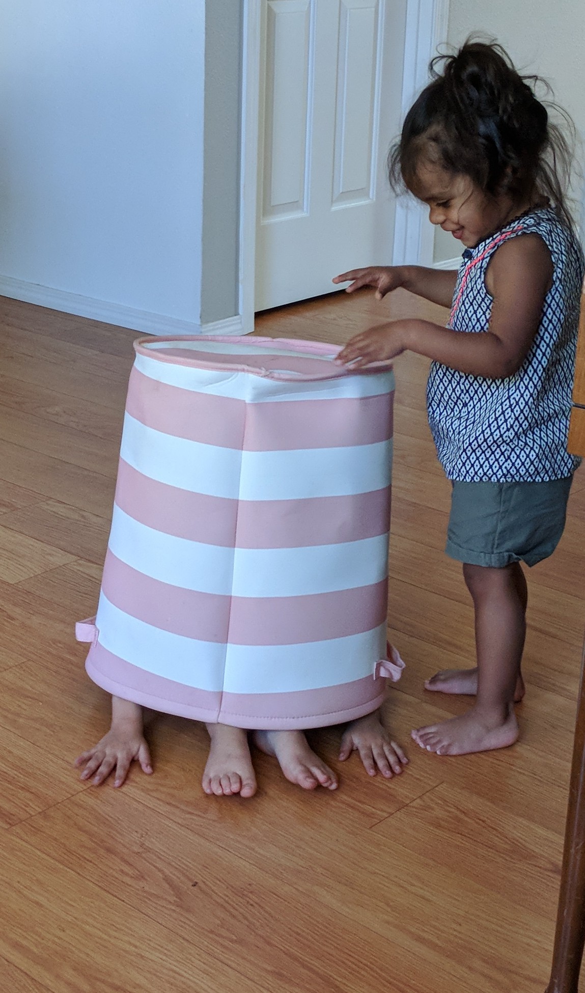 Olive examining Zoeys new hat