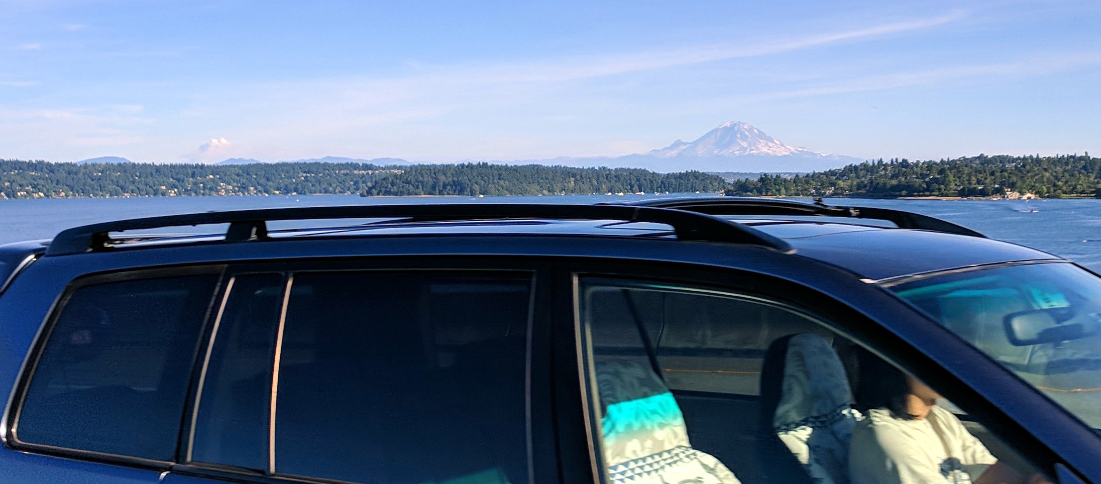 whizzing past two mountains