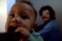 Scott teething with Alex looking