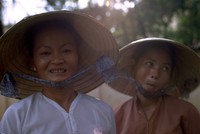 Vietnamese women sort of tolorating the photographer 1970