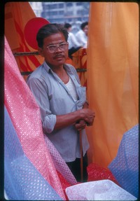 ss 016 1970 02 01 saigon market colorful cloth