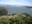 Golden Gate Bridge curving Earth
