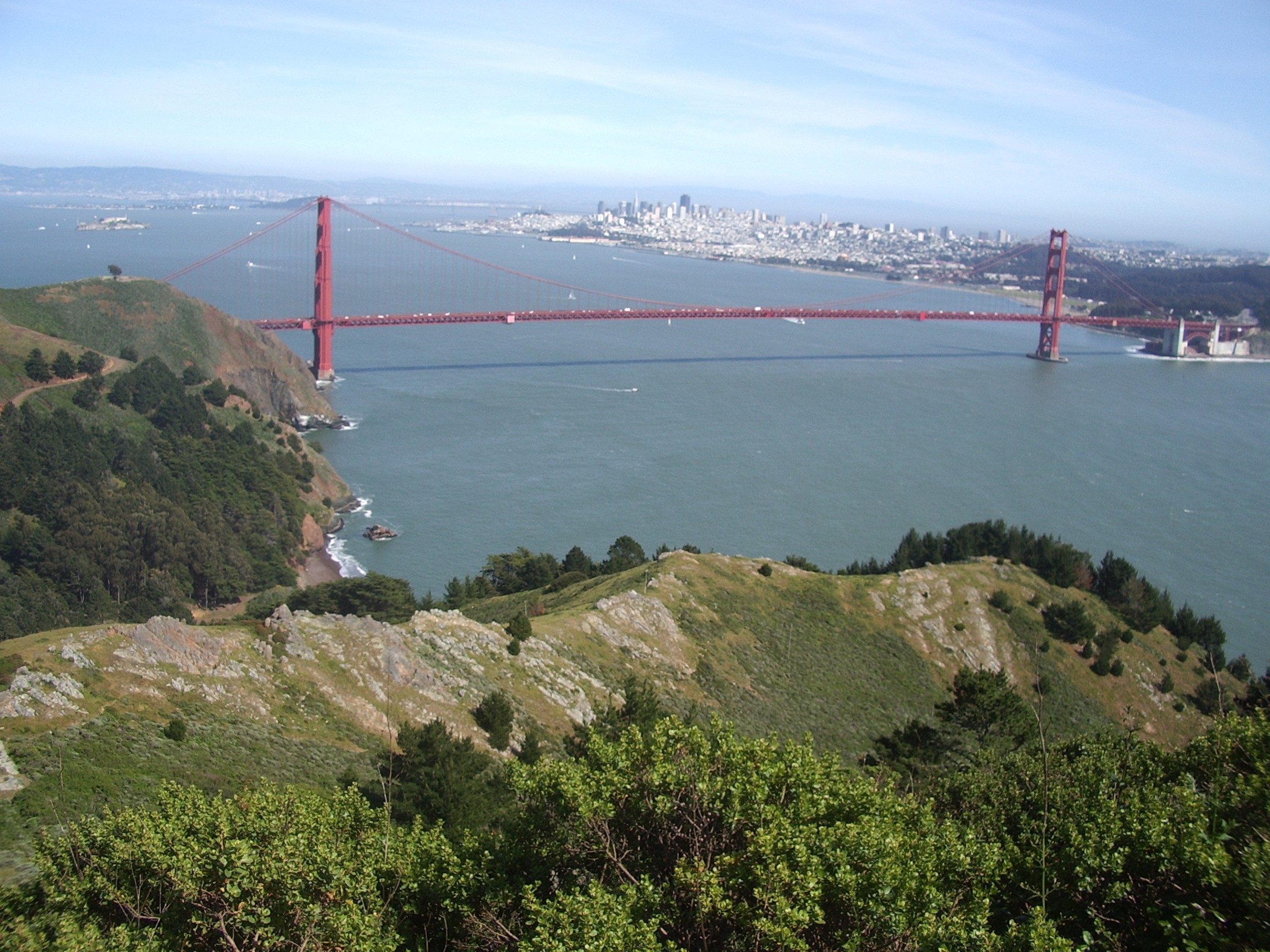 Golden Gate Bridge curving Earth