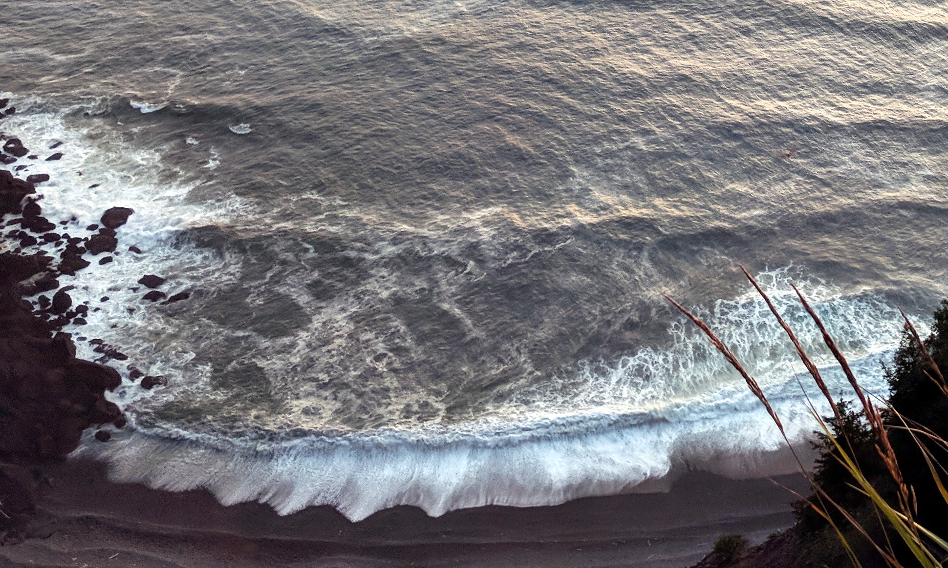 a wave touches Tillamook Head