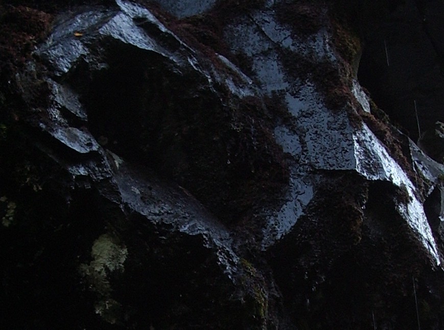 dark wet rock not a hole