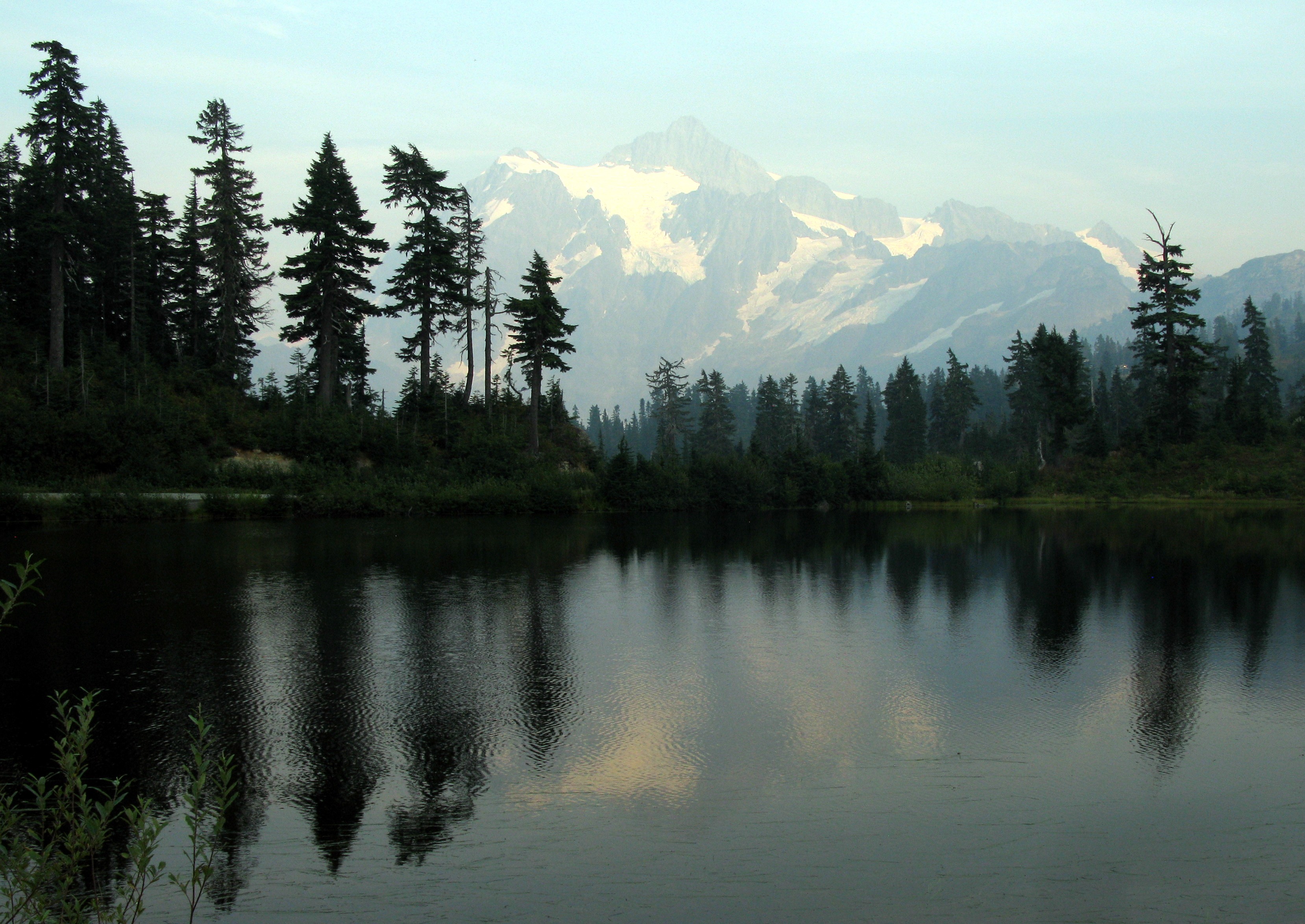 fire hazed Mt Shuksan over Picure Lake
