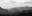 vague old mountains in the distance